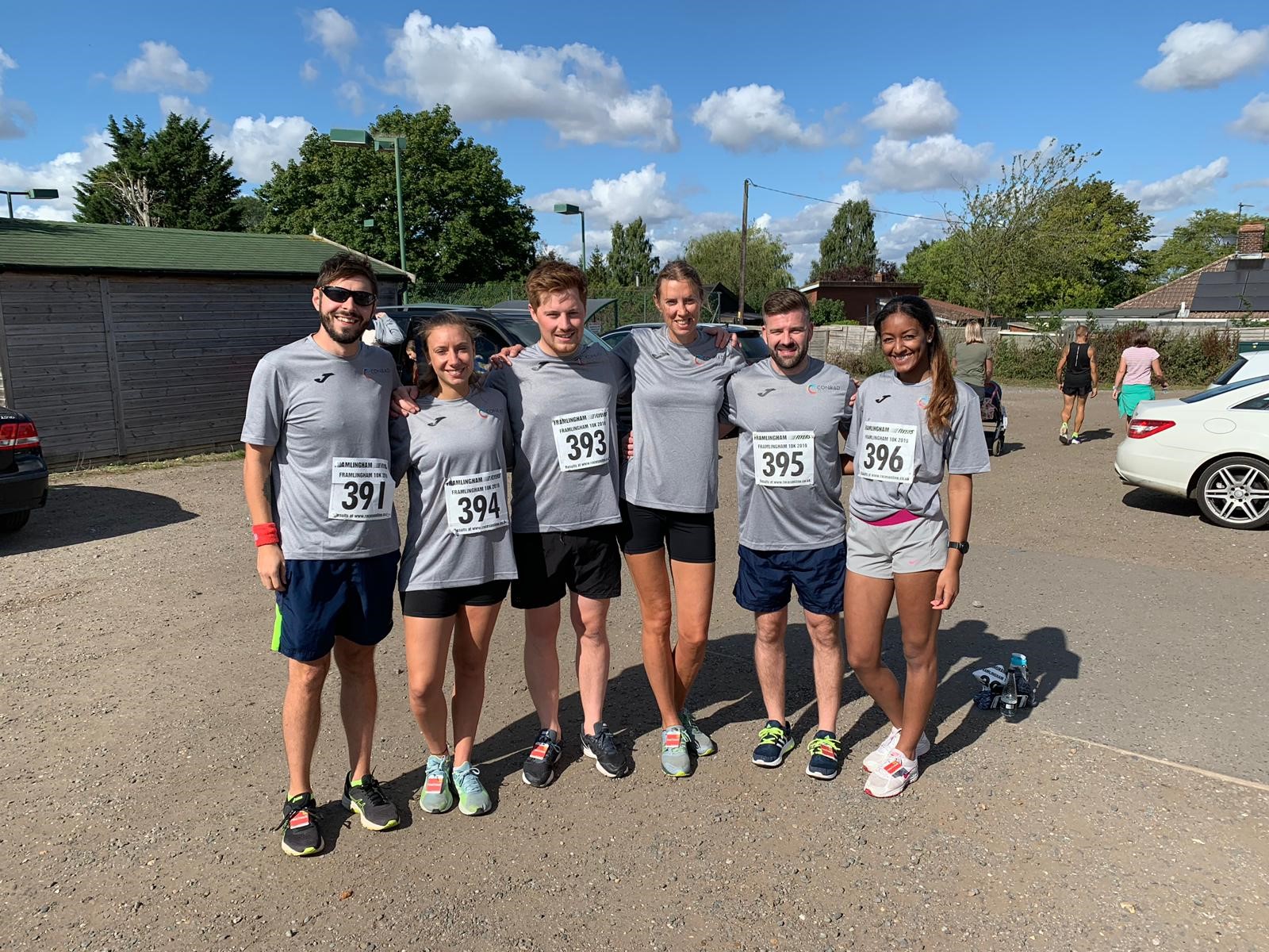 Group picture of Conrad runners before taking part in the 10k